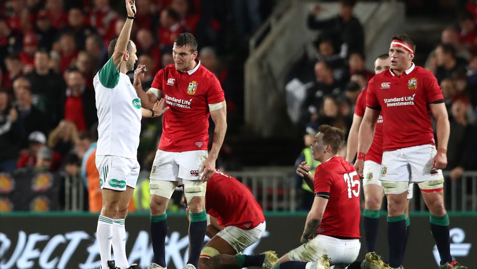 The referee awards New Zealand a late scrum