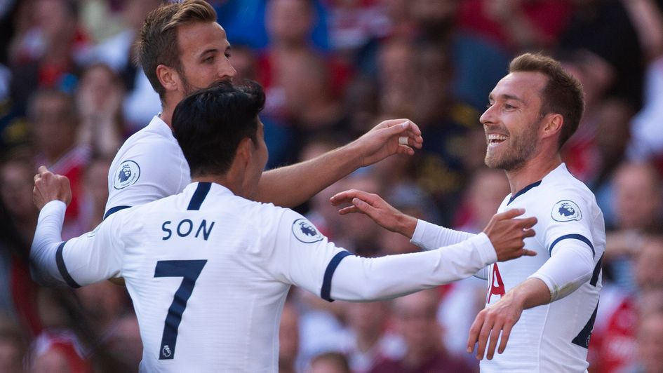 Tottenham celebrate Christian Eriksen's (right) goal in the north London derby at Arsenal