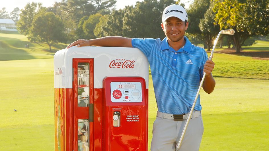 Xander Schauffele celebrates with the Calamity Jane trophy 