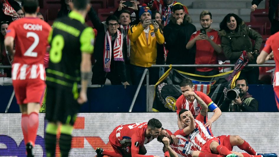 Atletico Madrid celebrate Jorge Resurreccion's very early goal