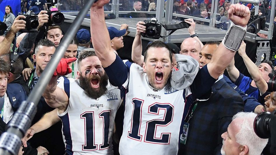 Tom Brady and Julian Edelman celebrate winning the Super Bowl