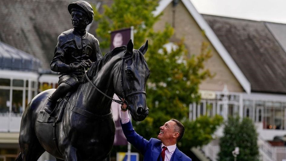 Frankie Dettori with his new bronze statue at Ascot