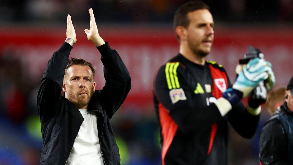 Wales boss Craig Bellamy (L) celebrates