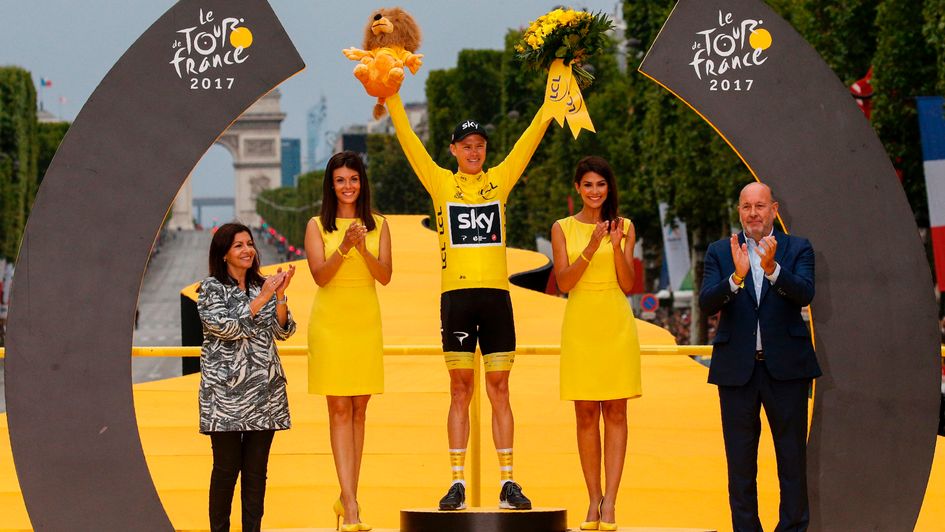 Chris Froome celebrates a fourth Tour de France