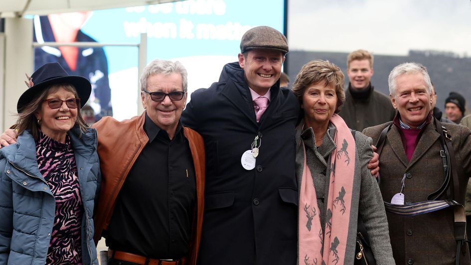 Trainer Paul Robson (centre)