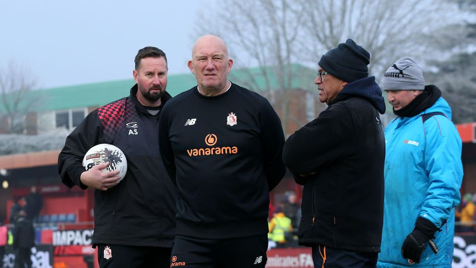 Alfreton Town manager Billy Heath (centre)