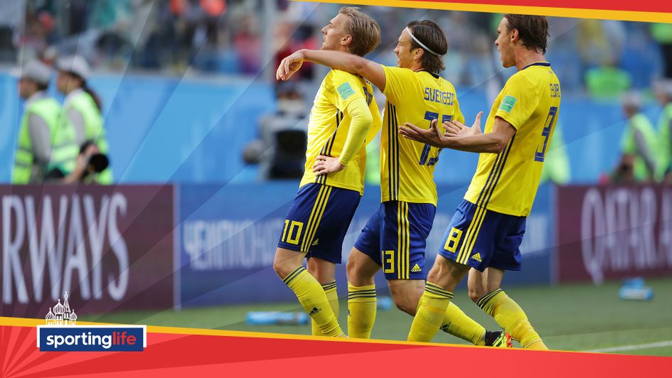 Emil Forsberg celebrates giving Sweden the lead against Switzerland