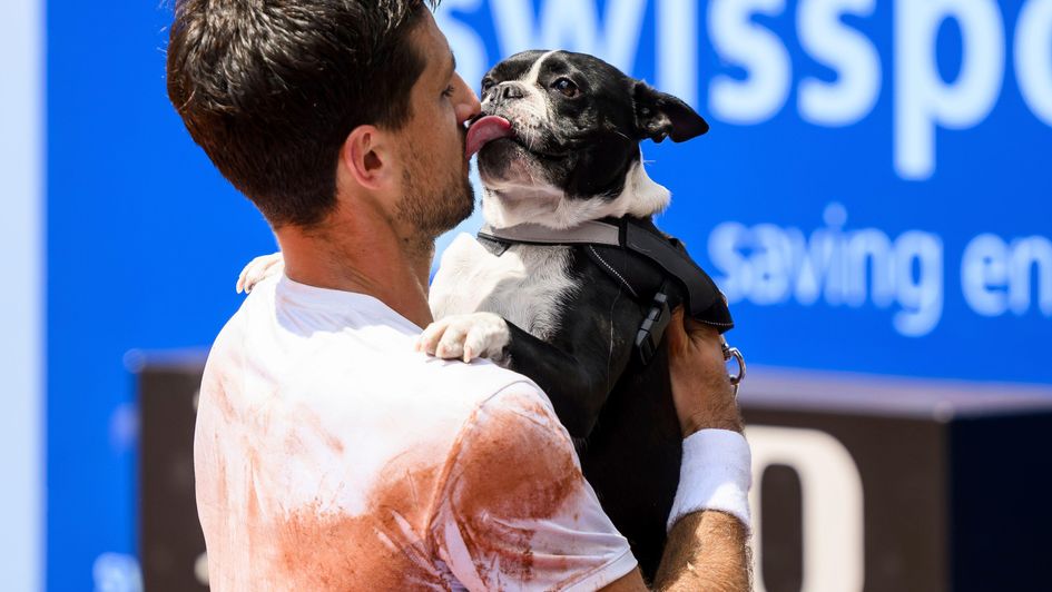 Pedro Cachin celebrates with his dog Tango