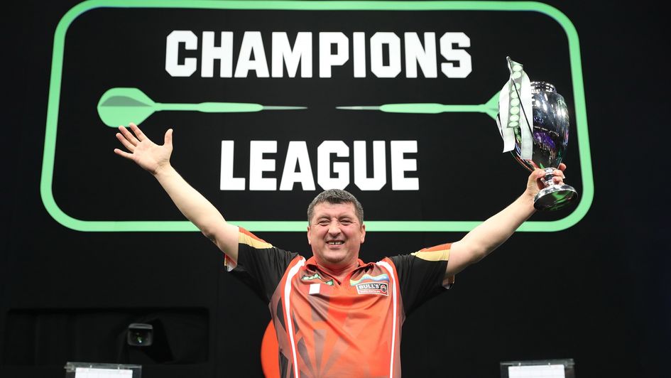 Mensur Suljovic with the Champions League of Darts trophy (Lawrence Lustig, PDC)