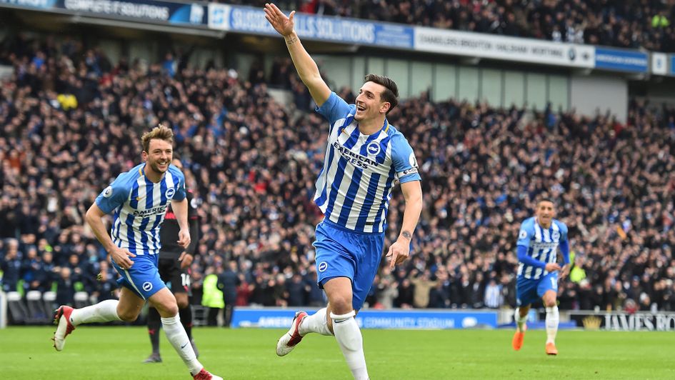 Lewis Dunk celebrates after scoring for Brighton