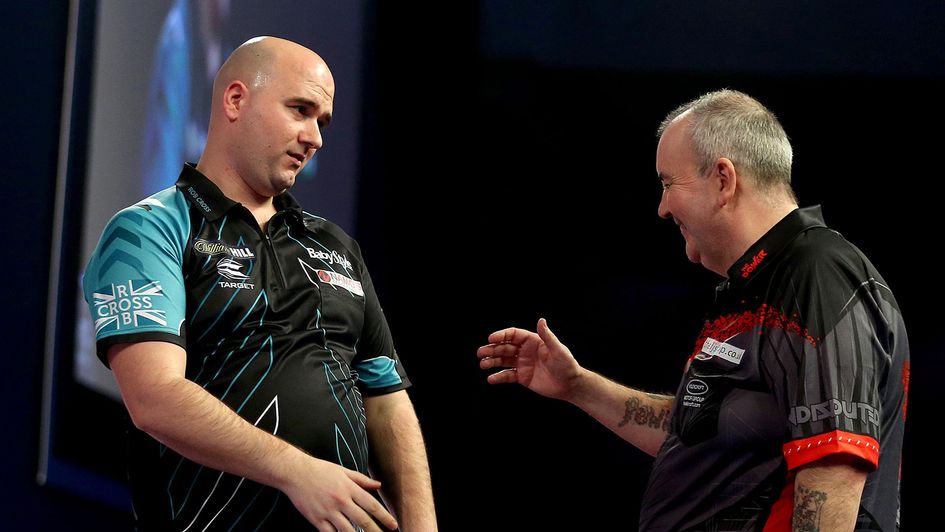 Rob Cross and Phil Taylor in the 2018 World Championship final