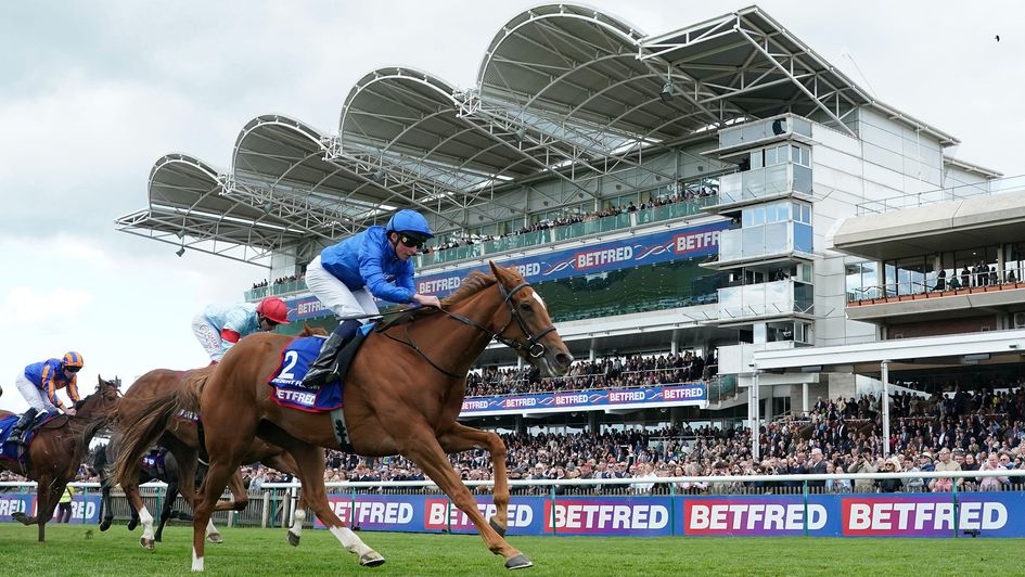 Desert Flower and William Buick win the 1000 Guineas