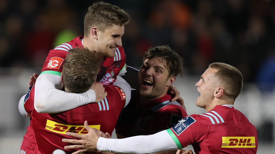 James Lang is congratulated on his match-winning kick