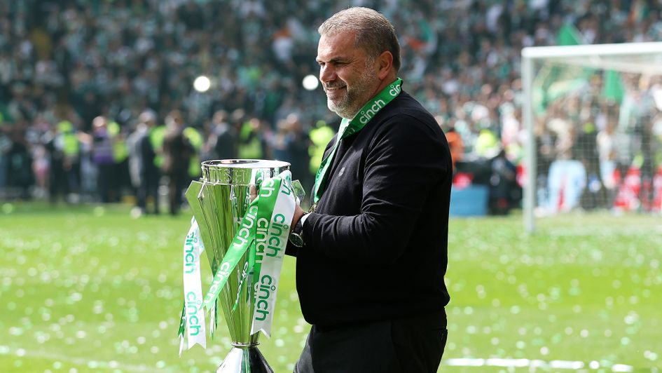 Celtic manager Ange Postecoglou with the Scottish Premiership trophy