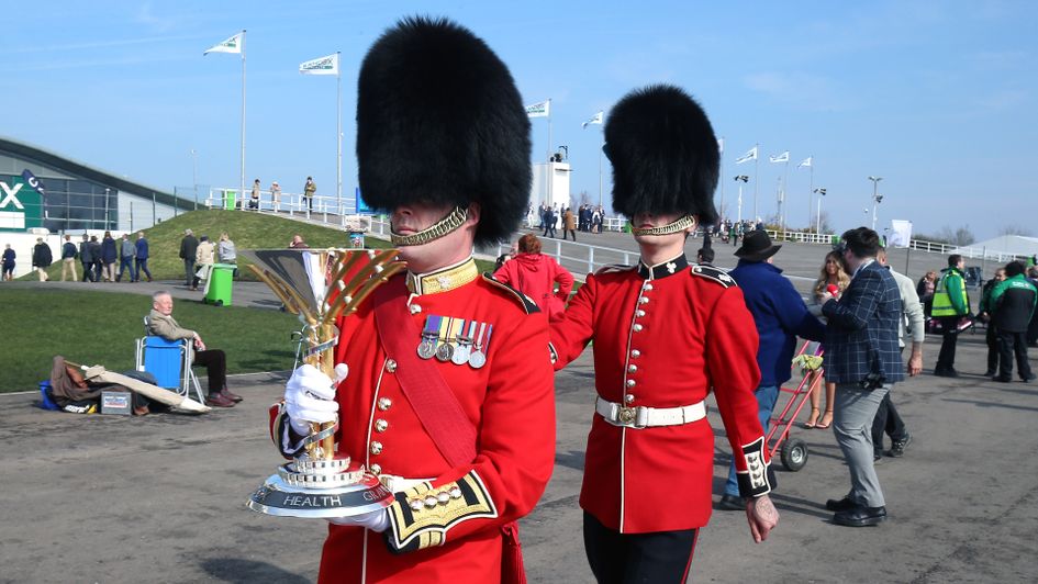 The Grand National Trophy is paraded through Aintree Racecourse