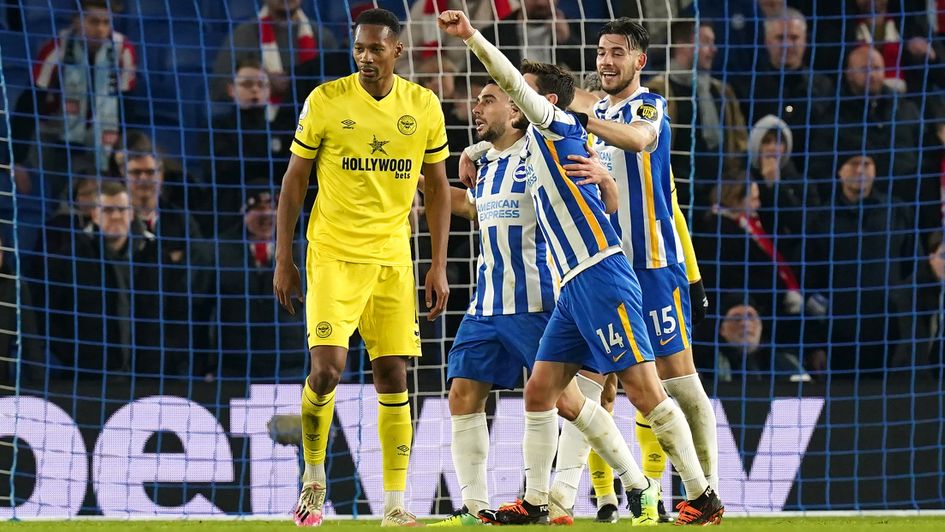 Neal Maupay celebrates his goal with his teammates