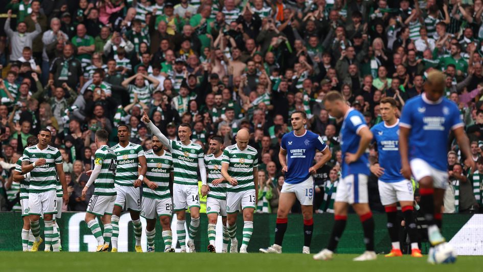 Celtic celebrate a goal against Rangers