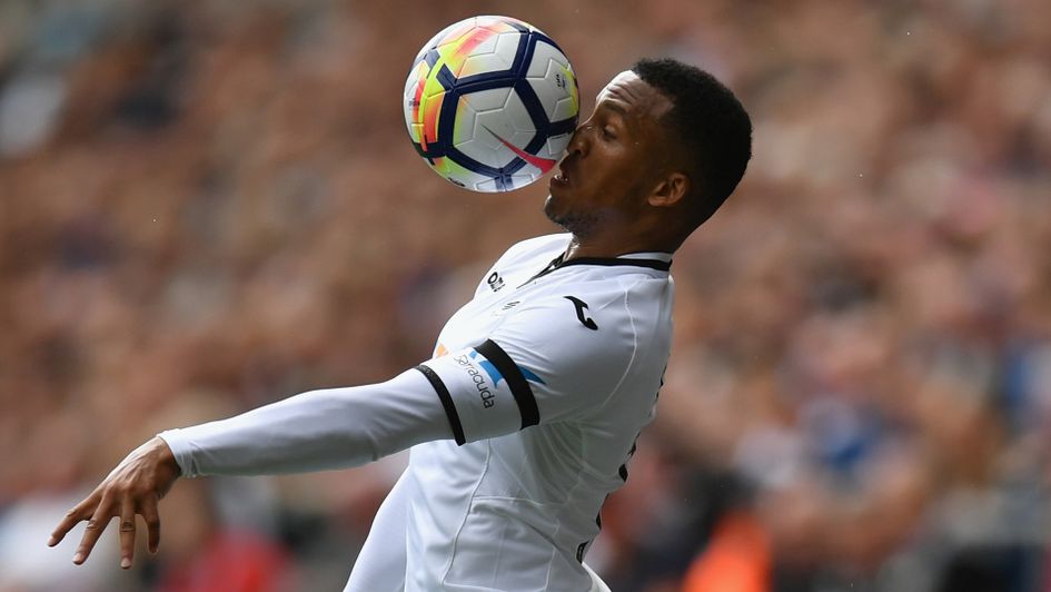 On the nose, son: Martin Olsson gets acquainted with the ball