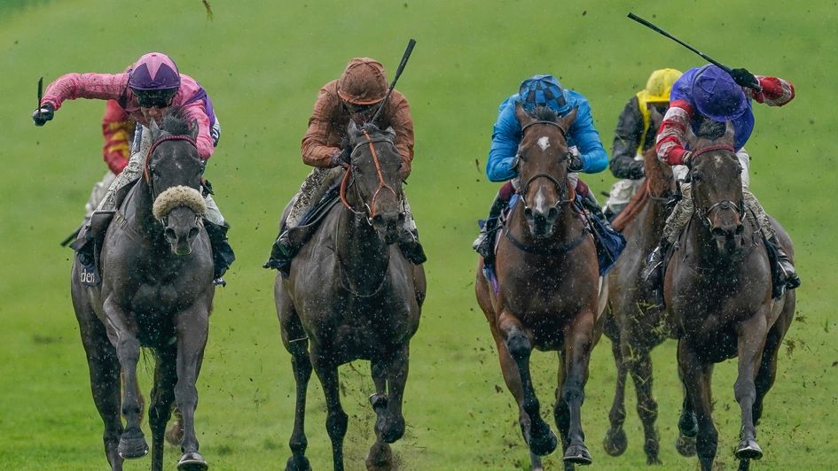 Azure Blue (left) on her way to victory