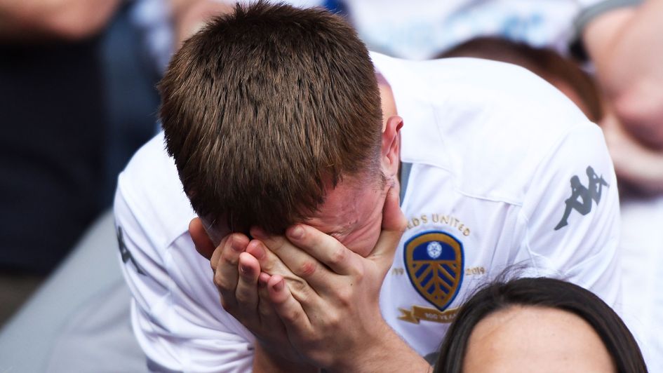 The reaction says it all, as a Leeds fan reacts to Derby's late equaliser