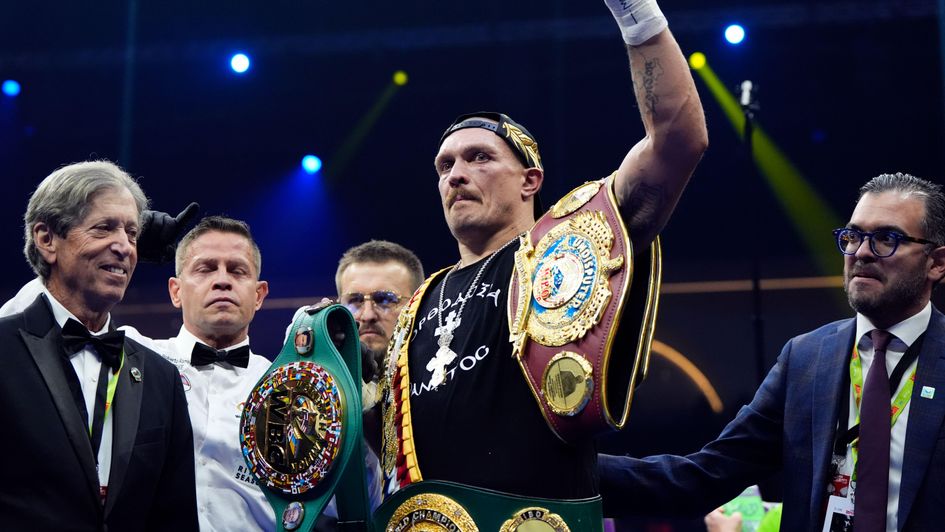 Oleksandr Usyk celebrates