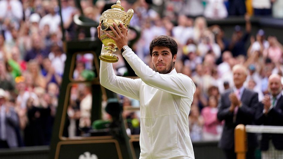 Carlos Alcaraz celebrates winning Wimbledon