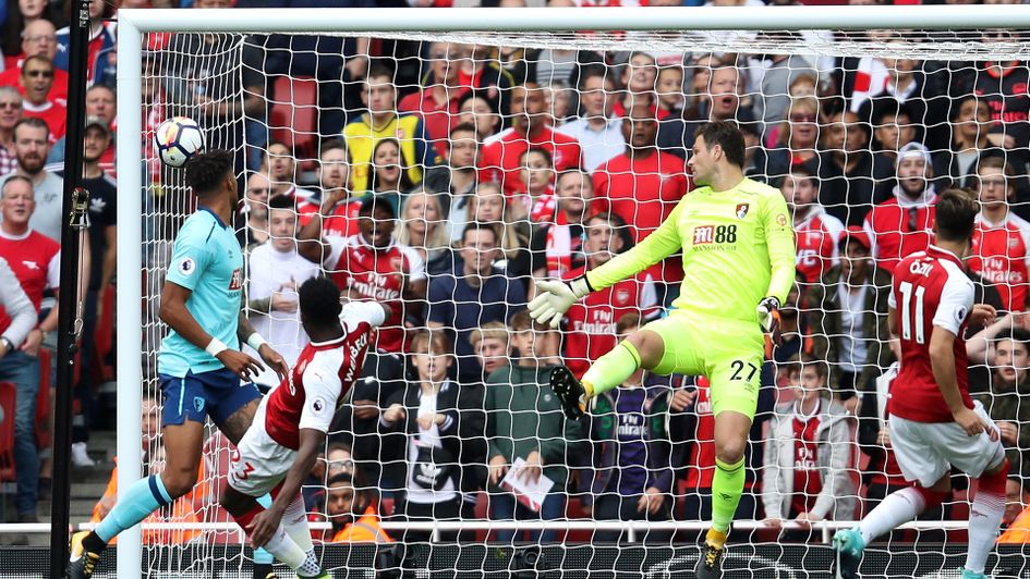 Danny Welbeck opens the scoring for Arsenal