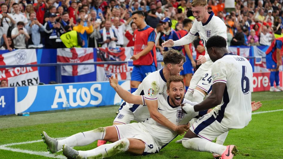 England's Harry Kane celebrates with team-mates after scoring their side's second goal of the game during the UEFA Euro 2024, round of 16 match at the Arena AufSchalke in Gelsenkirchen, Germany