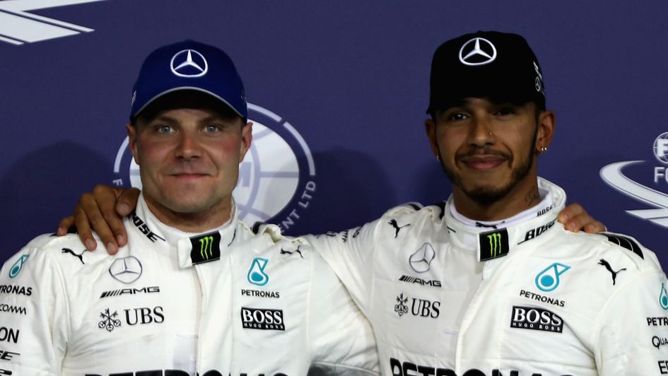 Valtteri Bottas (l) edged out Lewis Hamilton