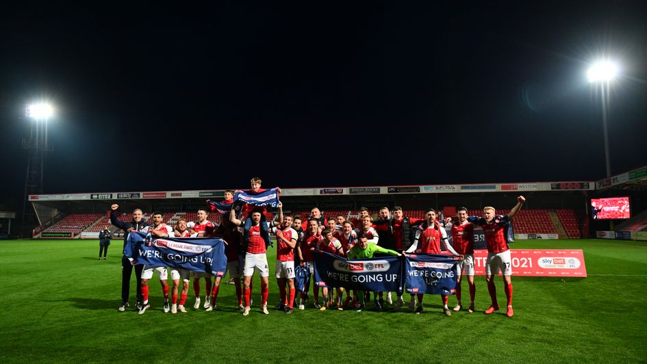 Cheltenham players celebrate promotion