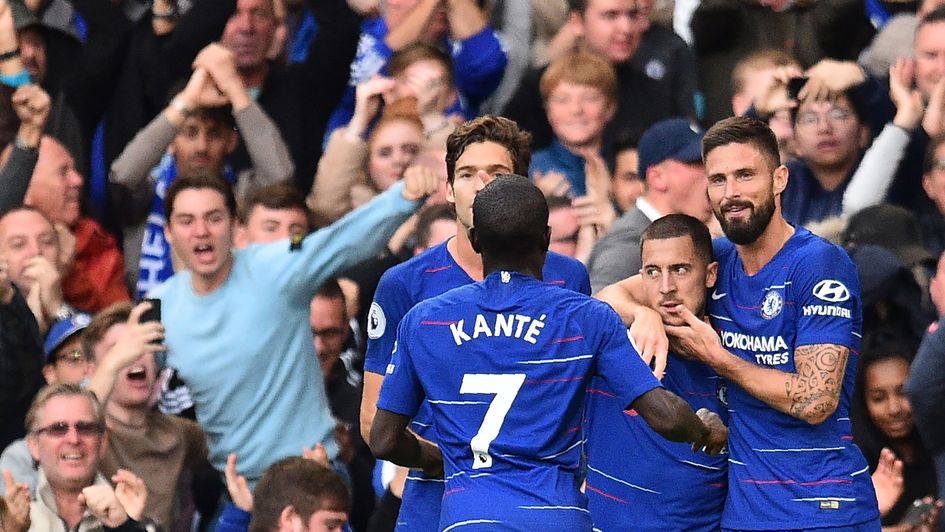 Chelsea players celebrate Eden Hazard's goal against Liverpool