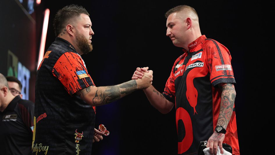Michael Smith and Nathan Aspinall (Picture: Kieran Cleeves/PDC)