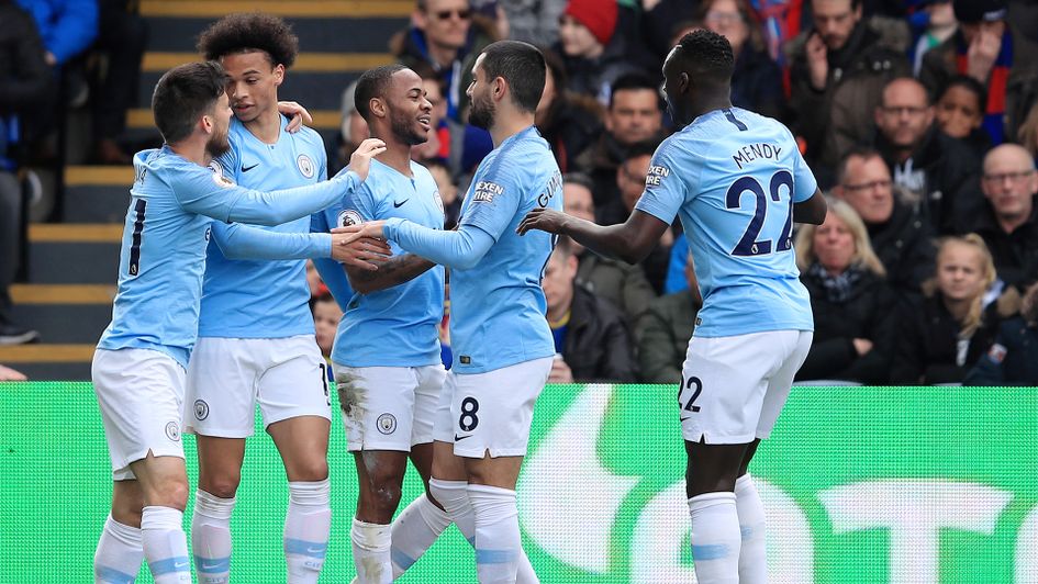 Manchester City celebrate Raheem Sterling's opener against Crystal Palace