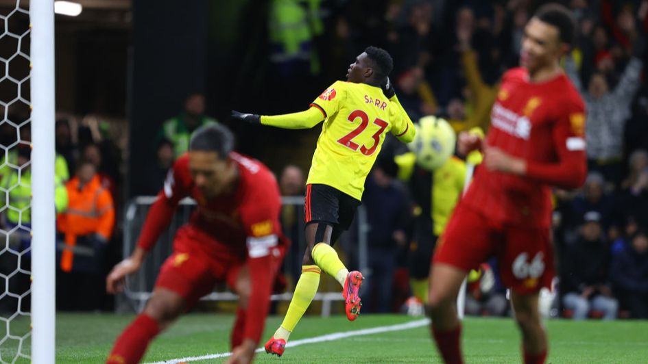 Ismaila Sarr wheels away in celebration