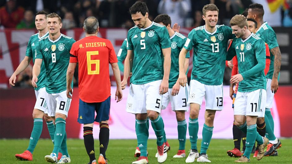 Thomas Muller and Germany celebrate after scoring against Spain