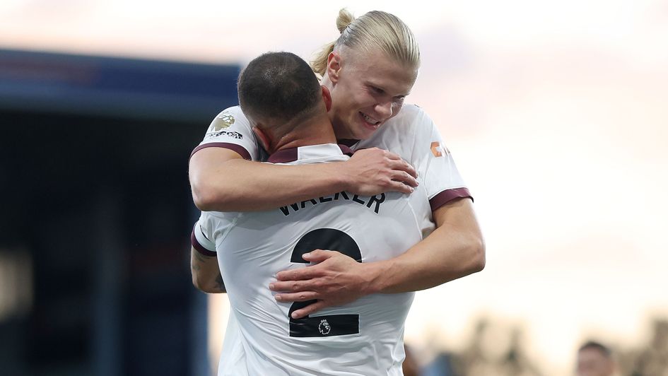 Erling Haaland celebrates with Kyle Walker