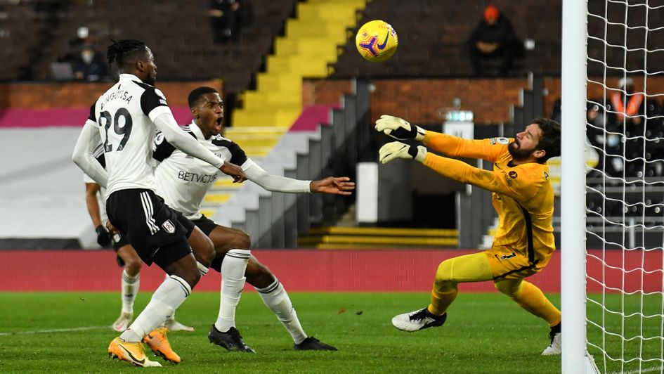 Andre-Frank Zambo Anguissa has an effort saved from close range against Liverpool