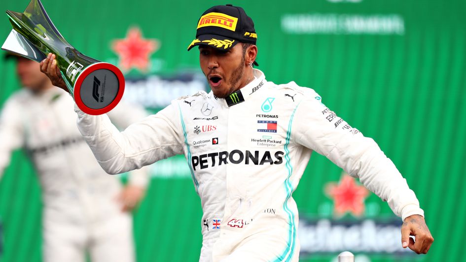 Lewis Hamilton celebrates his win in the Mexican Grand Prix