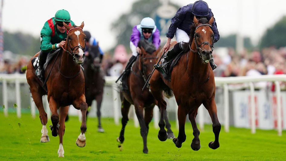 City of Troy (right) is too good for his rivals in the Juddmonte International