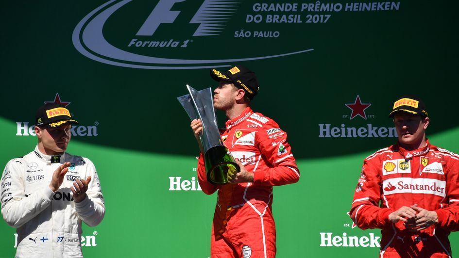 Sebastian Vettel celebrates victory at Interlagos