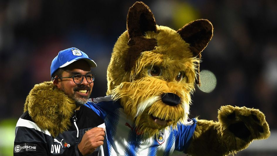 David Wagner (left) and Terry the Terrier celebrate