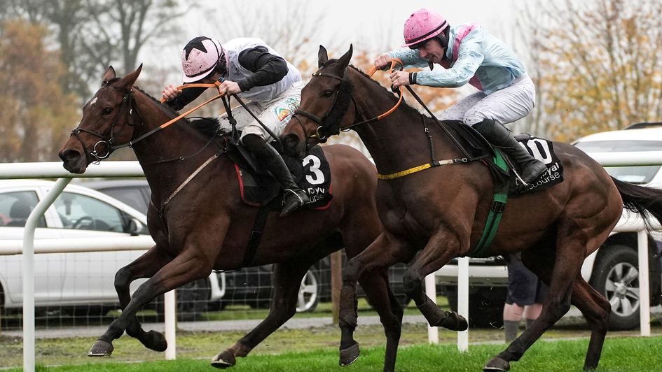 Kala Conti ridden by Carl Millar (left) before going on to win the Eventsec Handicap Hurdle