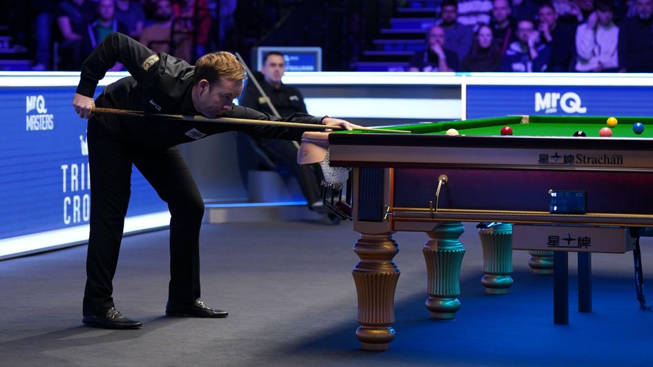 Ronnie O'Sullivan watches from his chair as Ali Carter takes control of their Masters final