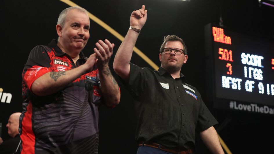 Phil Taylor was defeated by James Wade as both progressed (Picture: Lawrence Lustig/PDC)