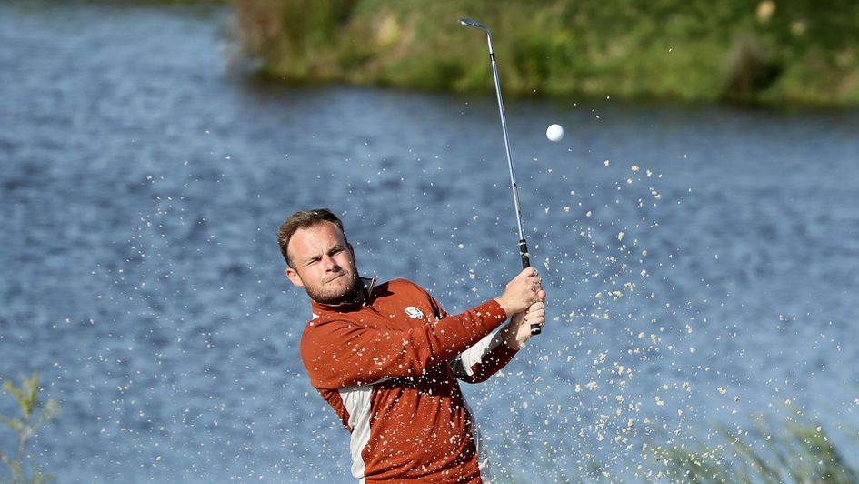 Tyrrell Hatton chips out during the Ryder Cup in Paris