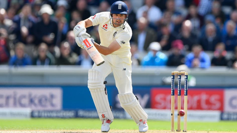 Alastair Cook drives through the covers