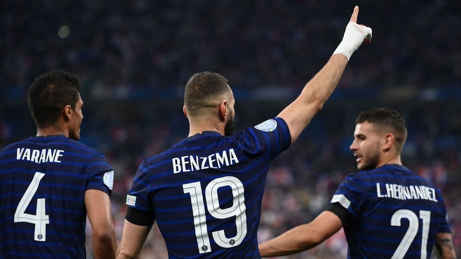 Karim Benzema celebrates a goal for France