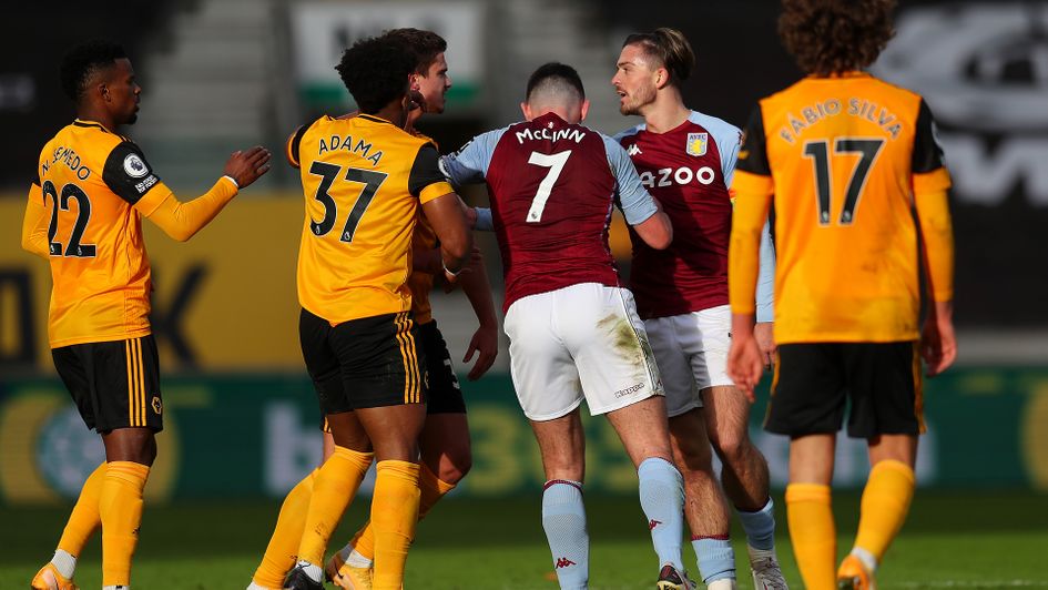 Leander Dendoncker and Jack Grealish exchange words