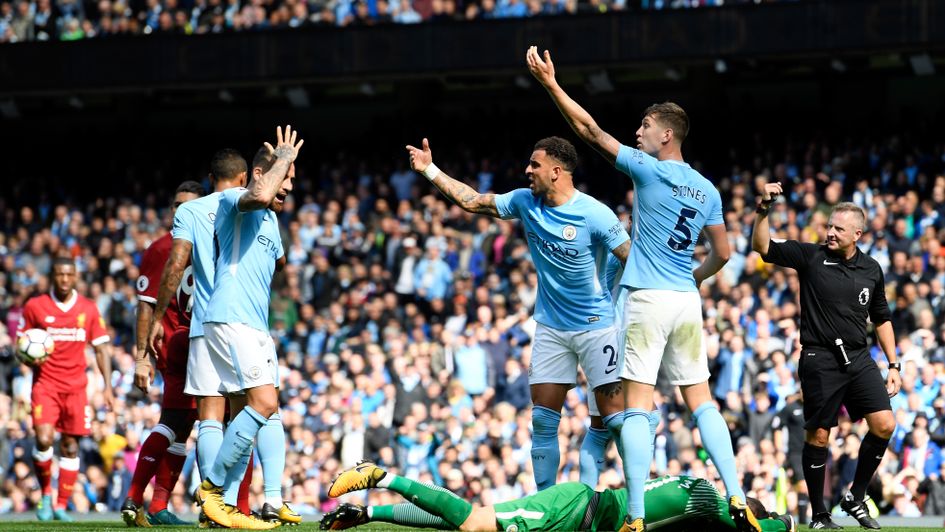 Ederson is flat out after Mane's challenge