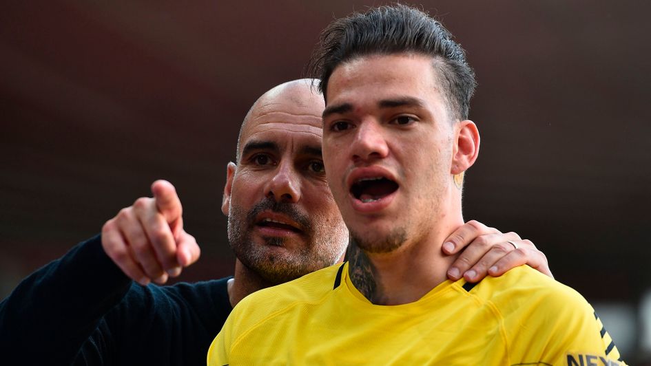 Pep Guardiola and Ederson